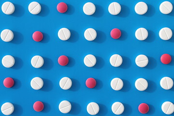 Abstract background of white pills on a blue background.