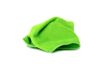 A green cleaning rag lies on a white isolated background.	