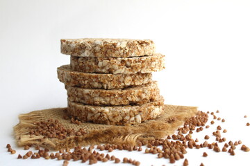 Crispbread lies on a burlap on a light background.