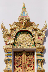 Fototapeta na wymiar Thai Buddhist temple gate in Thailand