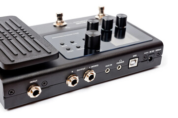 Obraz premium Guitar processor in a metal case for playing electric, acoustic and bass guitars.