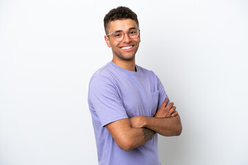 Fototapeta premium Young caucasian Brazilian man isolated on white background with arms crossed and looking forward
