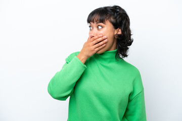 Young Argentinian woman isolated on white background doing surprise gesture while looking to the side