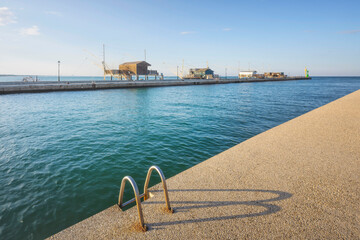 Cesenatico canal and fishing shacks. Romagna, Italy