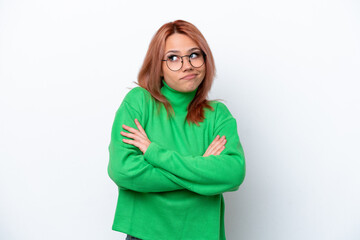 Young Russian girl isolated on white background making doubts gesture while lifting the shoulders