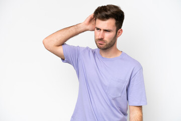 Young caucasian man isolated on white background having doubts while scratching head