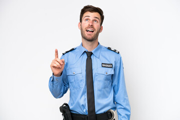 Young police caucasian man isolated on white background pointing up and surprised
