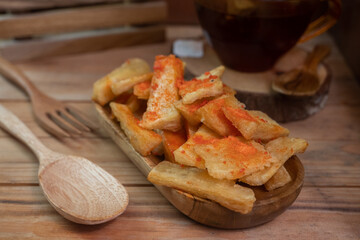 tela tela is a food originating from Indonesia which is made from fried cassava and sprinkled with balado seasoning powder