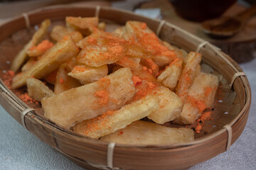 tela tela is a food originating from Indonesia which is made from fried cassava and sprinkled with balado seasoning powder