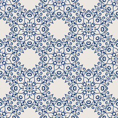 Vintage tile pattern. Seamless blue and white background with flower design
