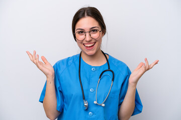 surgeon doctor woman holding tools isolated on white background with shocked facial expression