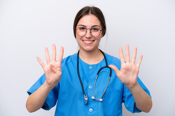 surgeon doctor woman holding tools isolated on white background counting nine with fingers