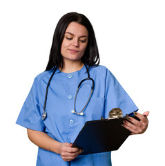A Caucasian woman, a nurse, holds a stethoscope on an isolated background. She represents care and...