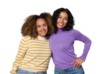 Two female friends isolated in studio happy, smiling and cheerful.