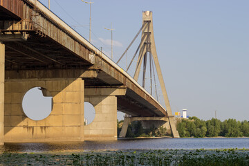Cable-stayed bridge across wide river, bottom view