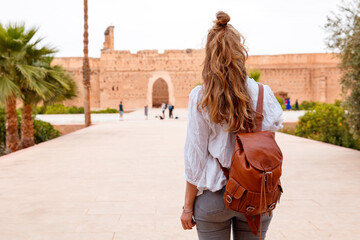 Fototapeta premium Woman tourist in Marrakech, el badi palace