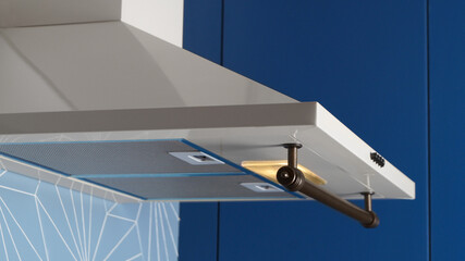 Modern electric exhaust hood in kitchen, closeup