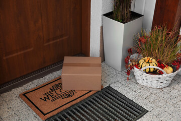 Parcel delivered on mat near front door