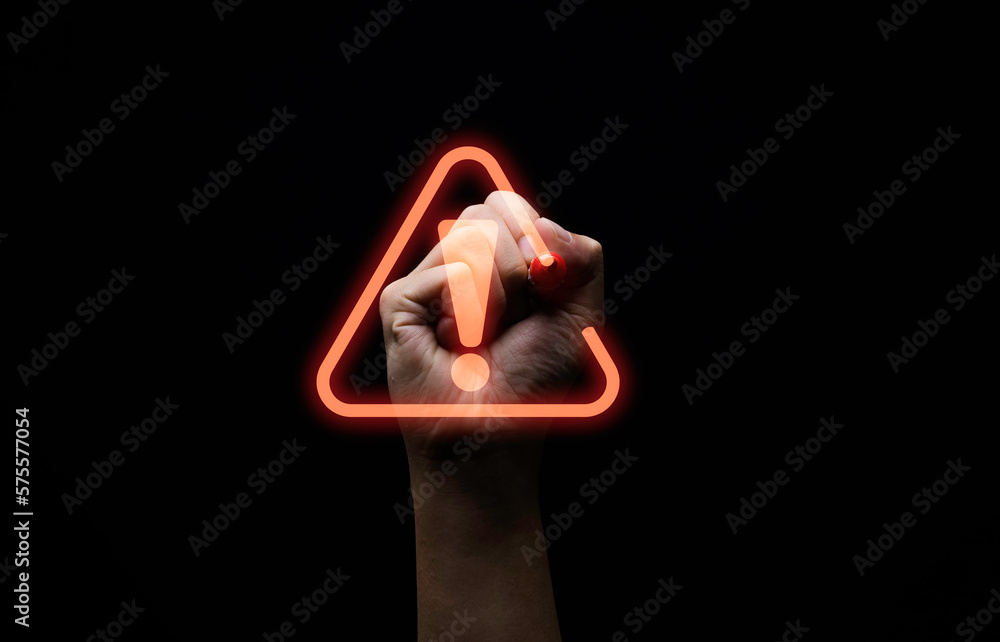 Poster hand writing red triangle caution exclamation warning sign for notification error and maintenance co