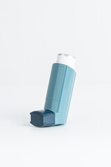 Ashtma inhaler isolated on white background.