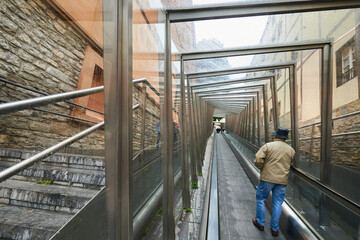 View of the people on the pedestrian mechanical walkway at 
