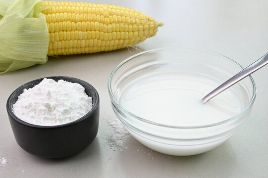 Cornstarch water in a bowl, used for the purpose of thickening sauce.