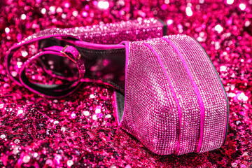 Fashionable punk square toe ankle strap pump on red sequins, closeup. Shiny party platform high heeled shoe