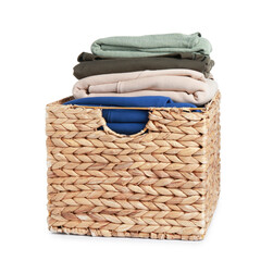 Wicker laundry basket with clean clothes isolated on white