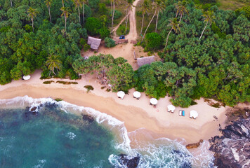 Fototapeta na wymiar Aerial view of the guesthouse and the hotel. Beautiful tourist wallpapers for for advertising. Asian landscape, photo from the drone
