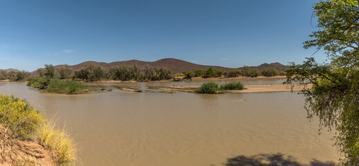 Landscape on the banks of the Kunene River, the border river between Namibia and Angola