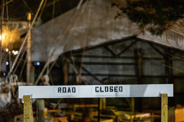 Solomons, Maryland USA A sign says Road Closed at night.