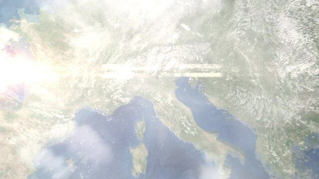 Earth zoom in from outer space to city. Zooming on Carpi, Modena, Italy. The animation continues by zoom out through clouds and atmosphere into space. Images from NASA