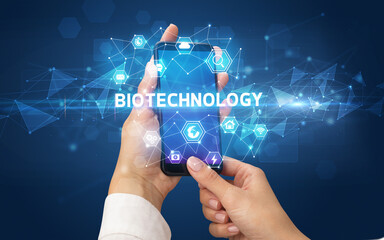 Hand using smartphone with technology concept