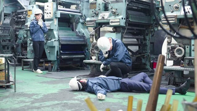 労働災害に対応する作業員