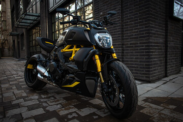Fototapeta na wymiar stylish black and yellow sports motorcycle on the city street