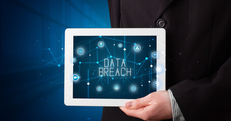 Person holding tablet, security concept