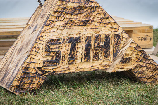 Bednary, Poland - September 25, 2021: Agroshow. Stihl brand engraved on wooden block. Manufacturer of woodworking equipment