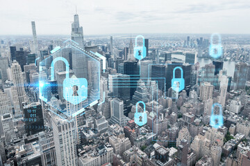 Fototapeta na wymiar Aerial panoramic city view of Upper Manhattan area, the East Side, river and Brooklyn on horizon, New York city, USA The concept of cyber security to protect confidential information, padlock hologram