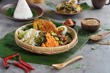 Urap is an Indonesian salad dish of steamed vegetables mixed with seasoned and dressed by coconut. Urap can be eaten as a salad for vegetarian or as a side dish.
