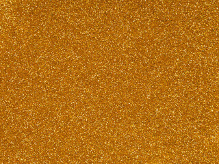 Orange glitter texture closeup. Saturated shiny holographic background for Christmas desktop, holiday New Year party, xmas seasonal decoration, social events, greeting wedding invitation card element.