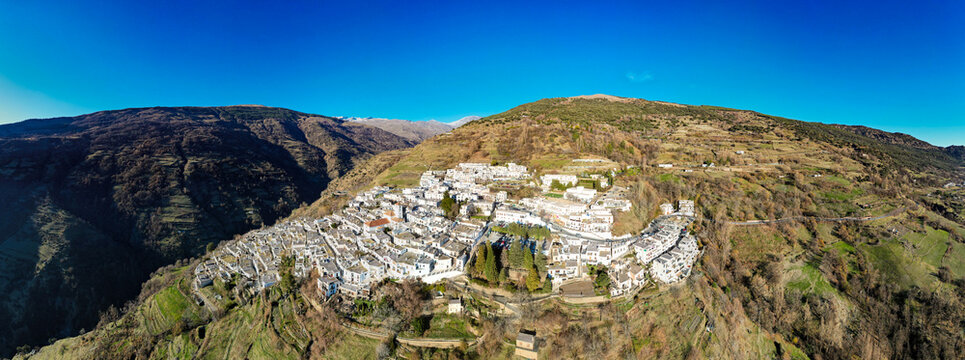 Aerial view above the beautiful village of Capileira in the gorge of the Poqueira in Andalusia Spain
