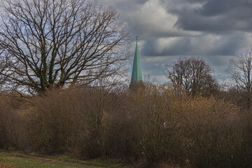 Dark clouds over the church tower