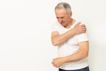 an elderly man's arm hurts