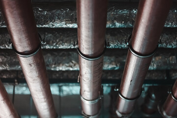 Engineering communications inside the building. Pipes with thermal insulation