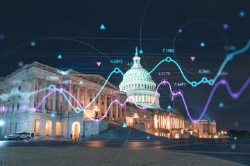 Front view, Capitol dome building at night, Washington DC, USA. Illuminated Home of Congress and Capitol Hill. Forex graph hologram. The concept of internet trading, brokerage and fundamental analysis © VideoFlow