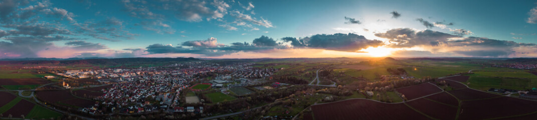 Aerial top view over Rottenburg am Neckar at sunset