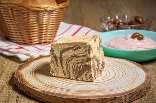 chocolate Greek halva with some fasting food like taramosalata,  bread and olives