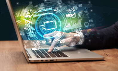 Business hand typing on a modern laptop