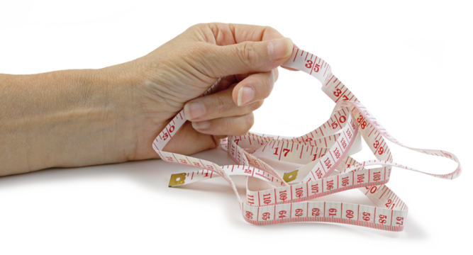 Weight Loss concept with female hand holding a measuring tape in one hand isolated transparent png file