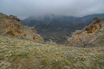 Landscape of Karadag Reserve in spring. View of rocks of ridge Karagach. Crimea